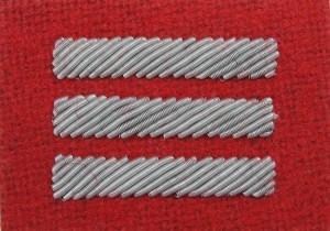Stopień Wojska Polskiego haftowany bajorkiem do beretu szkarłatnego - starszy kapral