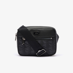 Embossed monogram shoulder bag
