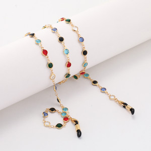 Brillenkette mit design in einer bunten gold kette von BRINE MED CARE