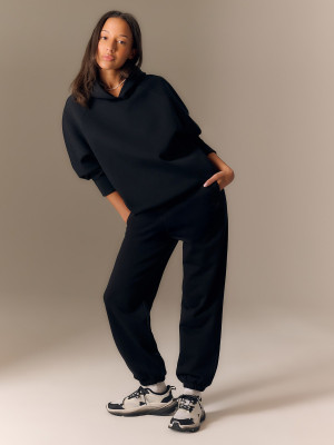 4F Bluza dresowa loose z kapturem damska - czarna