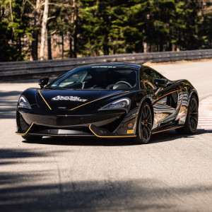 Jazda za kierownicą McLaren 570GT | Warszawa (Tor Bemowo) | SJS | dla dziecka | 1 okrążenie | Prezent | Voucher | Karta podarunkowa | Bon | Cena