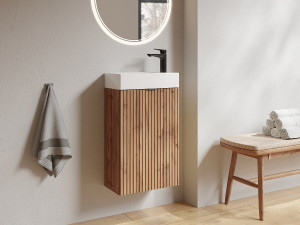 Vente-unique Geribbeld wastafelmeubel met omkeerbaar deurtje, licht naturel - H60 x L40 x D22 - VAHIRA