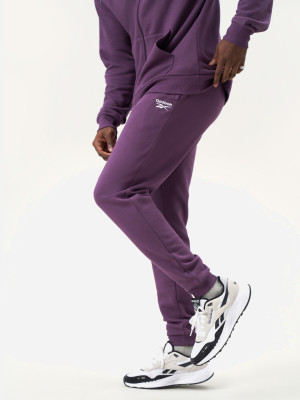 Spodnie dresowe ocieplane męskie Reebok Identity Small Logo Fleece Jogger 100206013 XL Śliwkowe (1200143859636). Spodnie sportowe męskie