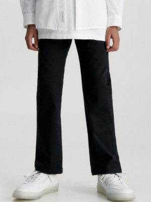 Spodnie dresowe dziecięce dla dziewczynki Calvin Klein IB0IB01678-BEH 128 cm Czarne (8720108243681). Spodnie dresowe dziewczęce