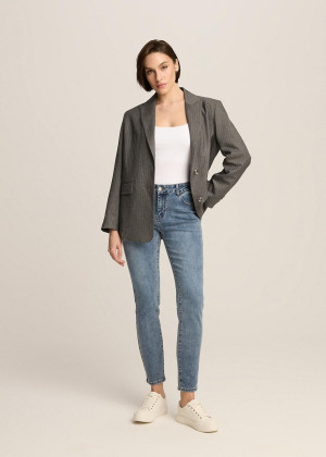 Jeansy slim fit ze średnim stanem