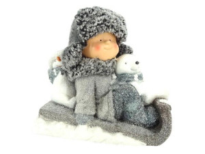 figurka chlopiec na saniach wys:30cm szer:32*18cm