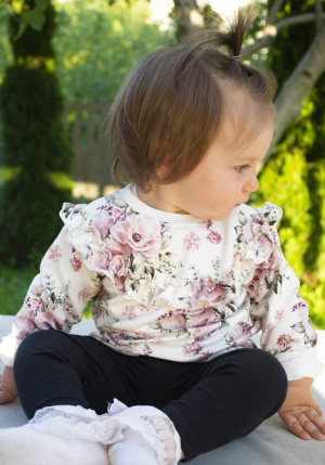 Bluza w kwiaty z falbanką