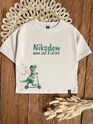 Koszulka dziecięca dinozaur na hulajnodze
