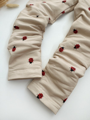 Legginsy dziecięce biedronki na beżu