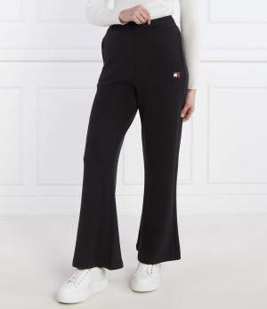 Tommy Jeans Spodnie dresowe BADGE WIDE EXT | flare fit