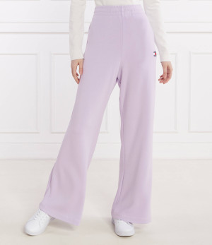 Tommy Jeans Spodnie dresowe BADGE WIDE EXT | flare fit