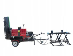 Hydrauliczny podajnik kłód drewna do piło-łuparek