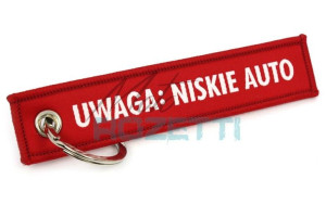 Zawieszka do kluczy samochodowych Uwaga Niskie Auto