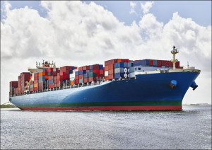 A massive container ship plies the Savannah River