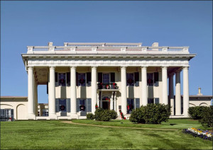 A mansion, decorated for Christmas., Carol Highsmi