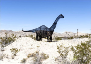 A whimsical dinosaur figure in southern Brewster C