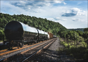 Black freight train on the railroad running across
