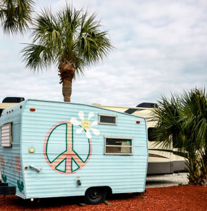 Hippie recreational vehicle at the entrance of the Gander RV Sales in Gulf