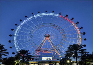 Neon-lit Ferris wheel at dusk in ICON Park in the Orlando, Florida., Carol