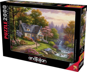 Puzzle 2000 Chatka z wodospadem w tle