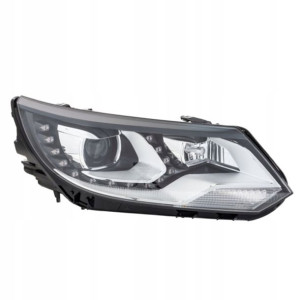 Reflektor P VW TIGUAN D3S/H7, elektry. z silnikiem