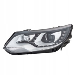 Reflektor L VW TIGUAN D3S/H7, elektry. z silnikiem