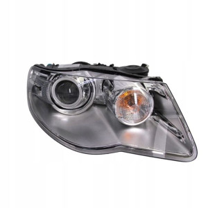 Reflektor P VW TOUAREG D1S/H7, elektr. z silnikiem