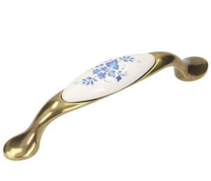 Uchwyt meblowy GAMET  Porcelanka UP19-96-AB-WHT-16, Stare złoto