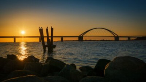 Fototapete Andere Meer, Strand, Sonne, Brücke, Sonnenuntergang