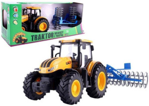Traktor rolniczy z broną talerzową
