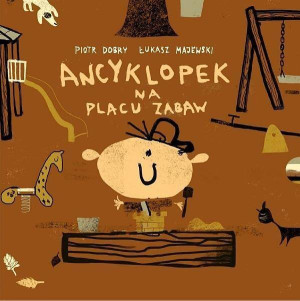 Ancyklopek na placu zabaw.