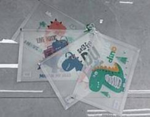Teczka A4 plastikowa zapinana dinozaury