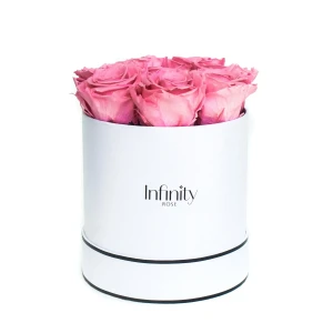 Jasnoróżowe wieczne róże w białym dużym flower boxie Infinity Rose