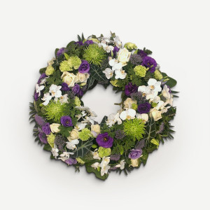 Interflora Rundpyntet krans med orkidéer