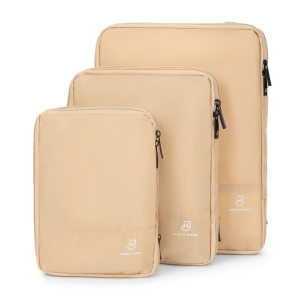 Zestaw trzech beżowych kompresyjnych
organizerów na odzież do walizki lub plecaka kostki do pakowania
podróżnego | Packing Cubes