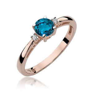 Złoty pierścionek W010 Topaz London Blue 0,50ct różowe złoto pr. 585