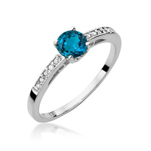 Złoty pierścionek W066 Topaz London Blue 0,50ct białe złoto pr. 585