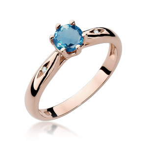 Złoty pierścionek W074 Topaz London Blue 0,50ct różowe złoto pr. 585