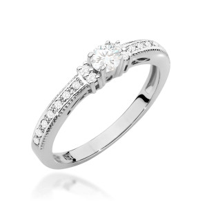 Złoty pierścionek W201 Diament 0,13ct białe złoto pr. 585