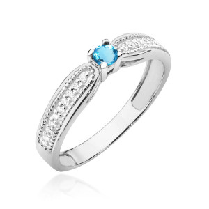Złoty pierścionek W449 Topaz 0,15ct białe złoto pr. 585