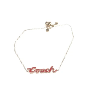 Coach Armband (gold) Metall / Emaille - gebraucht, mit Coach-Schriftzug in Schreibschrift & Rotes Emaille-Inlay