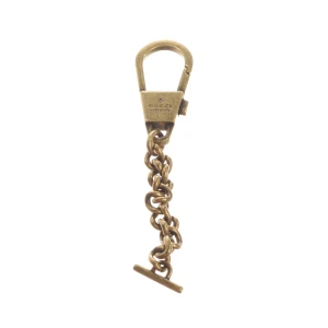 Gucci Anhänger (gold) Metall - gebraucht, Schlüsselanhänger mit Kettenelemente & Logo-Prägung