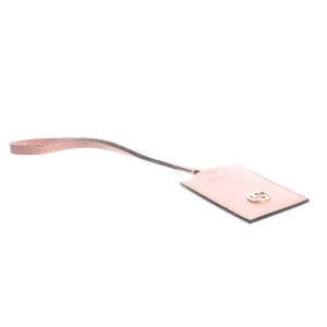 Gucci Interlocking GG Zubehör (rosa) Leder - gebraucht, Kofferanhänger mit Goldfarbenes Interlocking GG-Logo & Gekörnte Lederstruktur