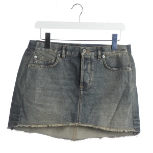 Dior Röcke (blau, Gr. 32) Denim - gebraucht, Minirock mit 5-Pocket-Stil & Fransen am Saum