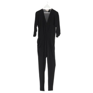 Michael Kors Jumpsuits (schwarz, Gr. M) Polyester - gebraucht, Damen Nietenbesatz an den Schultern, elastischer Taillenbund