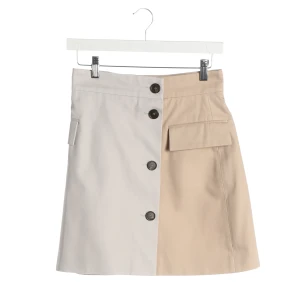 MSGM Röcke (beige, Gr. 38) Baumwolle - gebraucht, Minirock mit Color-Blocking & Knopfleiste