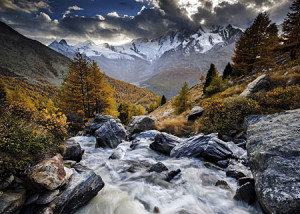 Heye-Puzzle 1000 Teile: Rauschender Bach durchzieht die Berge