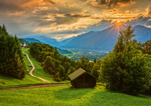 Schmidt-Spiele-Puzzle 1500 Teile: Sonnenuntergang über dem Bergdorf Wamberg
