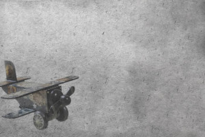Fototapeta Pokój młodzieżowy samolot, zabawka, szare tło, retro