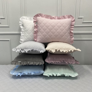 Pikowana poduszka z falbanką - kolory